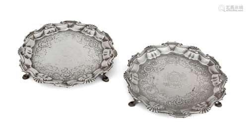 A pair of George III silver waiters, London, 1749, Hugh Mill...