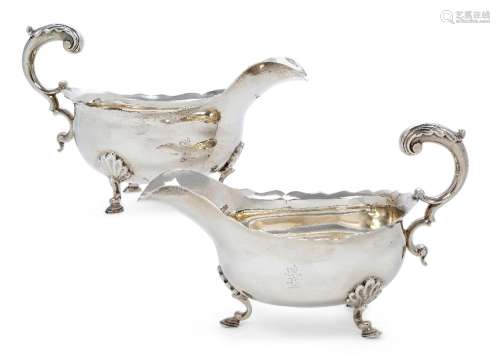 A pair of George III silver sauceboats, London 1797 and 1798...