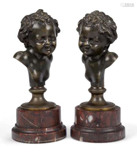 A pair of French bronze busts of children