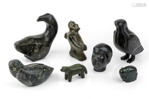 A group of six Inuit soapstone carvings