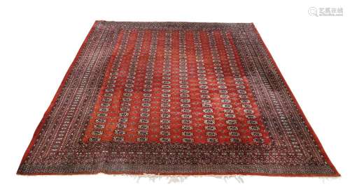 A Pakistani Bokhara red ground carpet