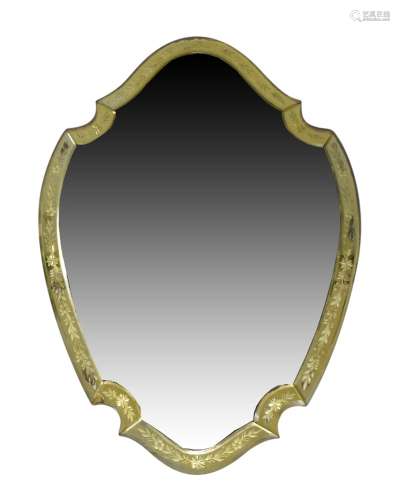 A Venetian style shield shaped wall mirror