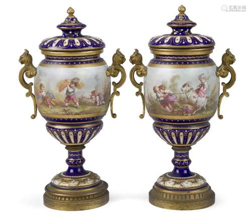 A pair of Sevres-style gilt-bronze mounted pot-pourri vases ...