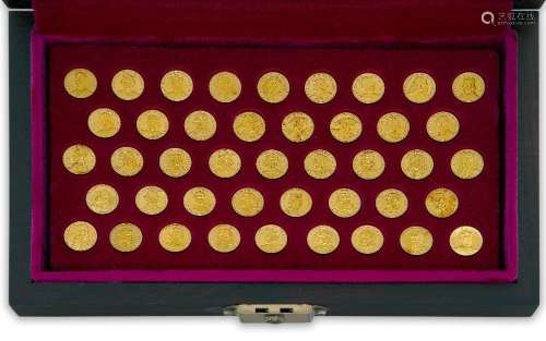 A cased set of forty-three 22ct gold medallions by John Pinc...