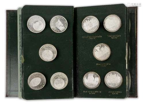 A Danbury Mint limited edition set of fifty silver medals