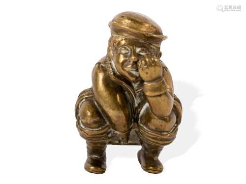 Whimsical bronze sculpture of a squatting man, German or Dut...