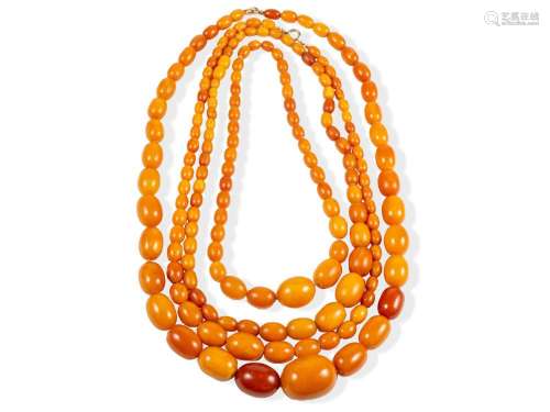 Convolute 4 amber necklaces