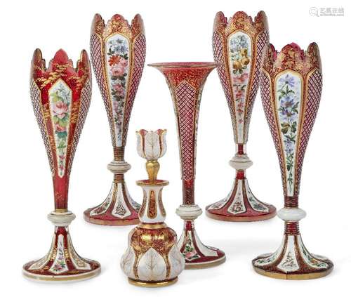 A group of Bohemian red glass vessels, 19th century, compris...