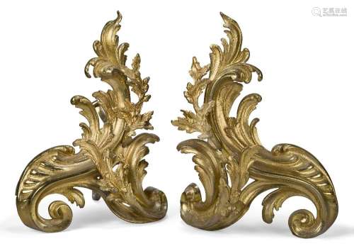 A pair of French gilt-bronze chenets, first half  20th centu...