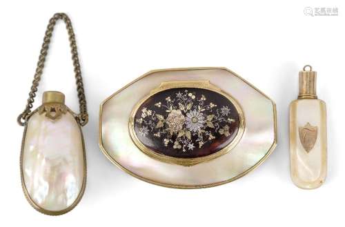 An oval gilt-metal mounted mother-of-pearl snuff box, 19th c...