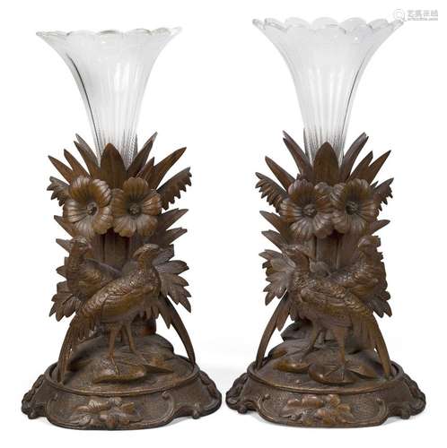 A pair of Swiss 'Black Forest' wood vase stands, c.1900, eac...