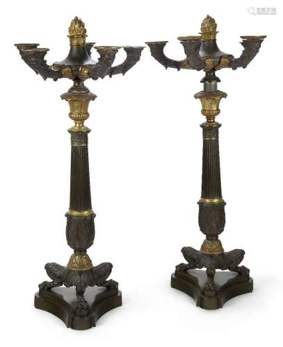 A pair of Restauration gilt and patinated bronze five-light ...