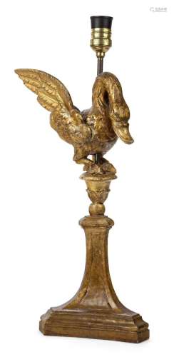 A carved giltwood and gesso swan sat atop a floral urn, 19th...