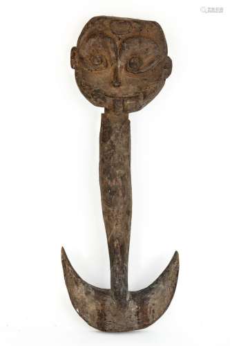 A Sepik carved wooden suspension hook, Papua New Guinea, Mal...