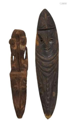 A Sepik wooden shield, Papua New Guinea, Melanesia, carved w...