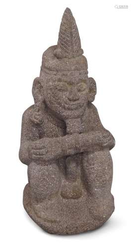 A Nias Island carved stone Gowe Ni'oniha ancestor figure, In...