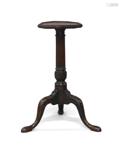A George II mahogany tripod wine table, the nonagonal top wi...