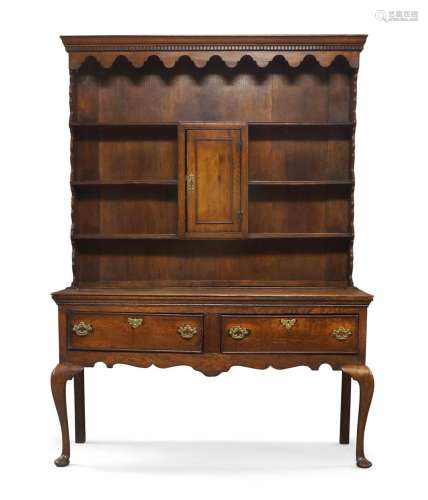 A George III oak dresser, c.1790, the superstructure with to...