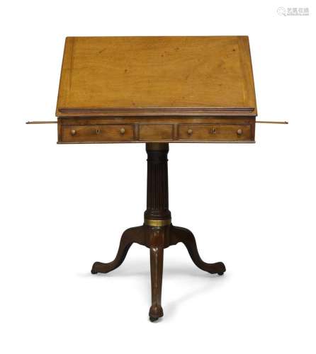 A George III and later mahogany duet writing table, the revo...