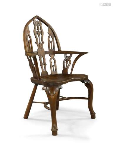 A George III style elm and beech Gothic Windsor armchair, 20...