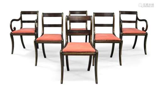 A set of six Regency mahogany and brass inlaid dining chairs...