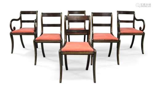 A set of six Regency mahogany and brass inlaid dining chairs...