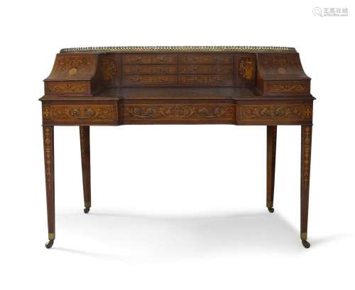 A late Victorian marquetry inlaid mahogany Carlton House des...