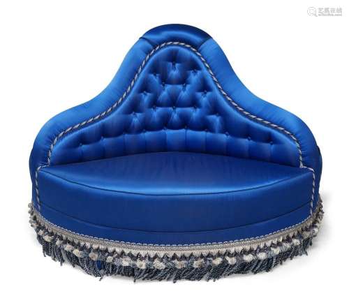 A Victorian style conversation sofa, 20th century, with blue...
