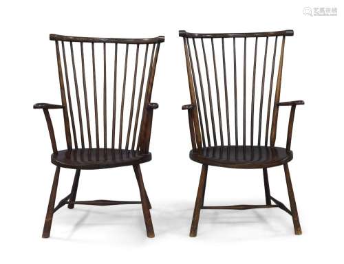 A pair of mahogany Windsor chairs, late 19th century, with s...