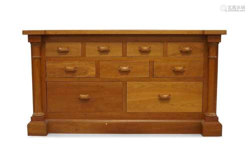 A cherry wood inverted breakfront chest, 21st century, with ...