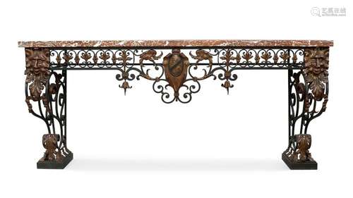 A wrought and cast iron console table, 20th century, with mo...