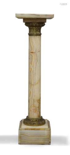 A gilt-bronze mounted onyx column, early 20th century, with ...