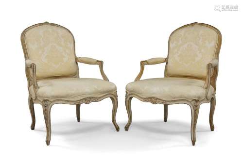 A pair of French carved beech fauteuil, 19th century, with s...