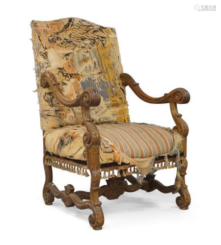 A French Louis XV style carved oak armchair, early 20th cent...