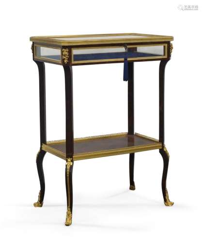 A French rosewood bijouterie table, early 20th century, gilt...