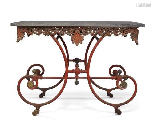 A French wrought iron butchers table, 19th century, black ma...
