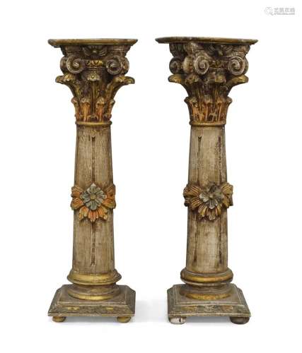 A pair of Italian carved Corinthian column stands, 20th cent...