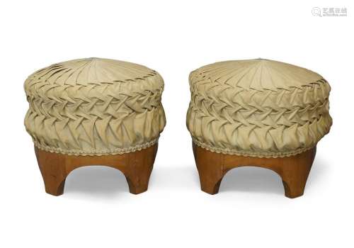 A pair of Biedermeier walnut stools, 19th century, with plea...