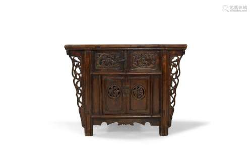 A Chinese elm side cabinet, early 20th century, the rectangu...