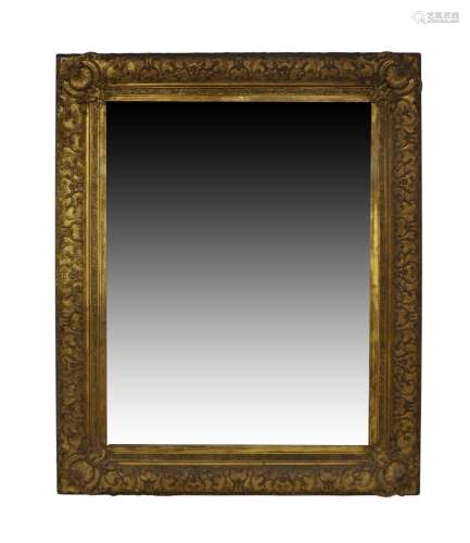 An early Victorian giltwood and gesso mirror, the C-scroll f...