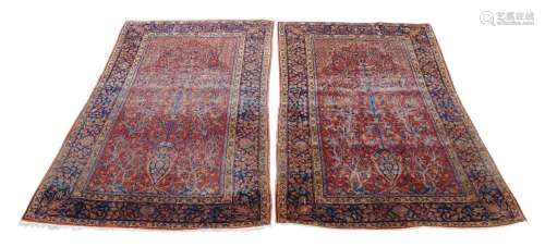 A pair of central Persian Sarouk rugs, 20th century, with va...