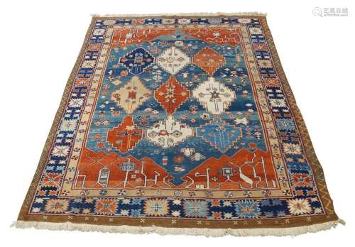 A Turkish Azeri oriental rug, 20th century, central nine dia...