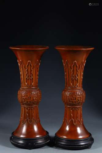 A pair of boxwood chilong and banana leaf pattern