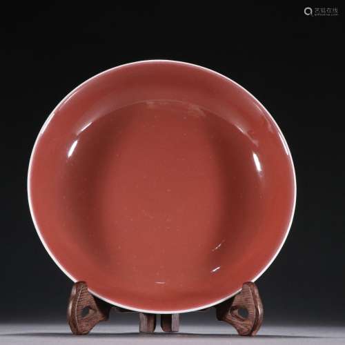 Red glazed plain plate.