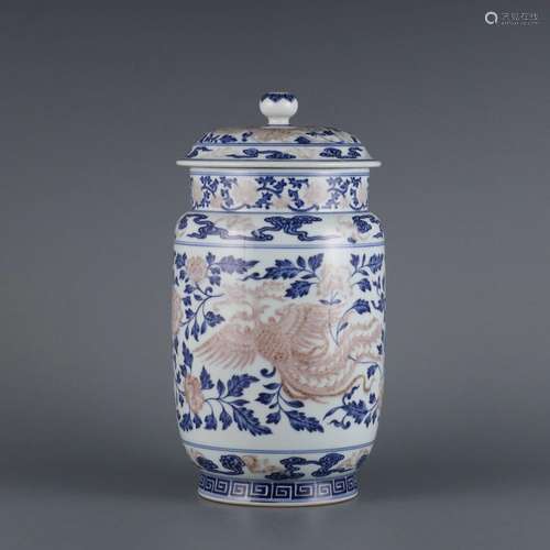 Blue and white glazed red phoenix wearing peony flower pot.