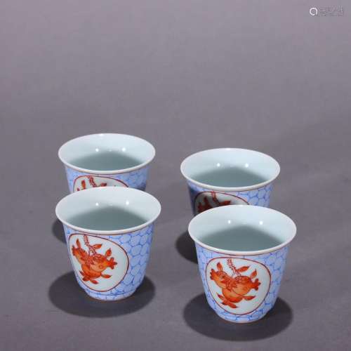 A set of alum red glaze pomegranate bell cups