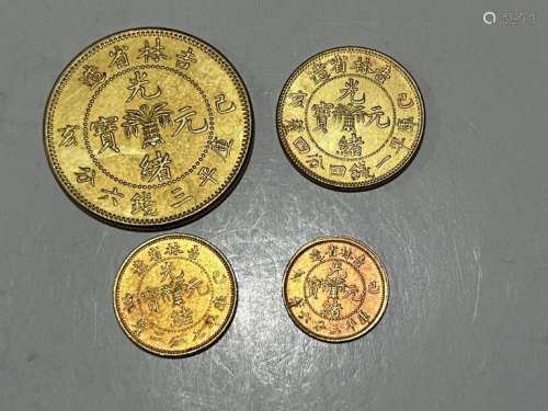 Four Chinese Coins