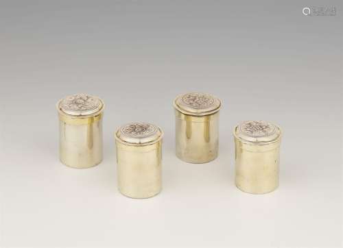 Four Augsburg parcel gilt silver boxes from a travel necessa...