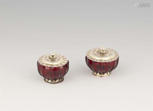A pair of vermeil-mounted ruby glass dishes