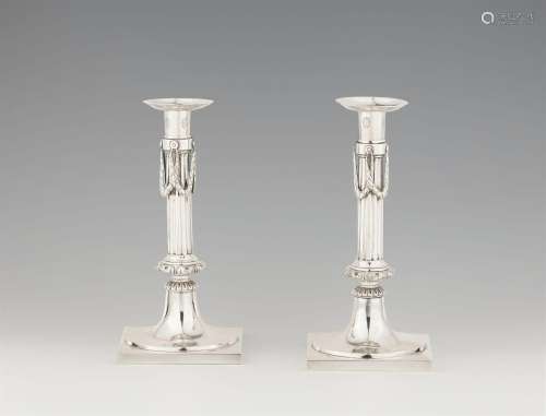 A pair of Neoclassical Augsburg silver candlesticks